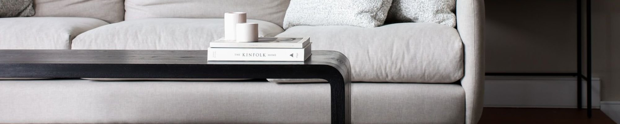 white couch and black coffee table on a brown hardwood floor | Majestic Floors and More LLC in Waunakee, WI